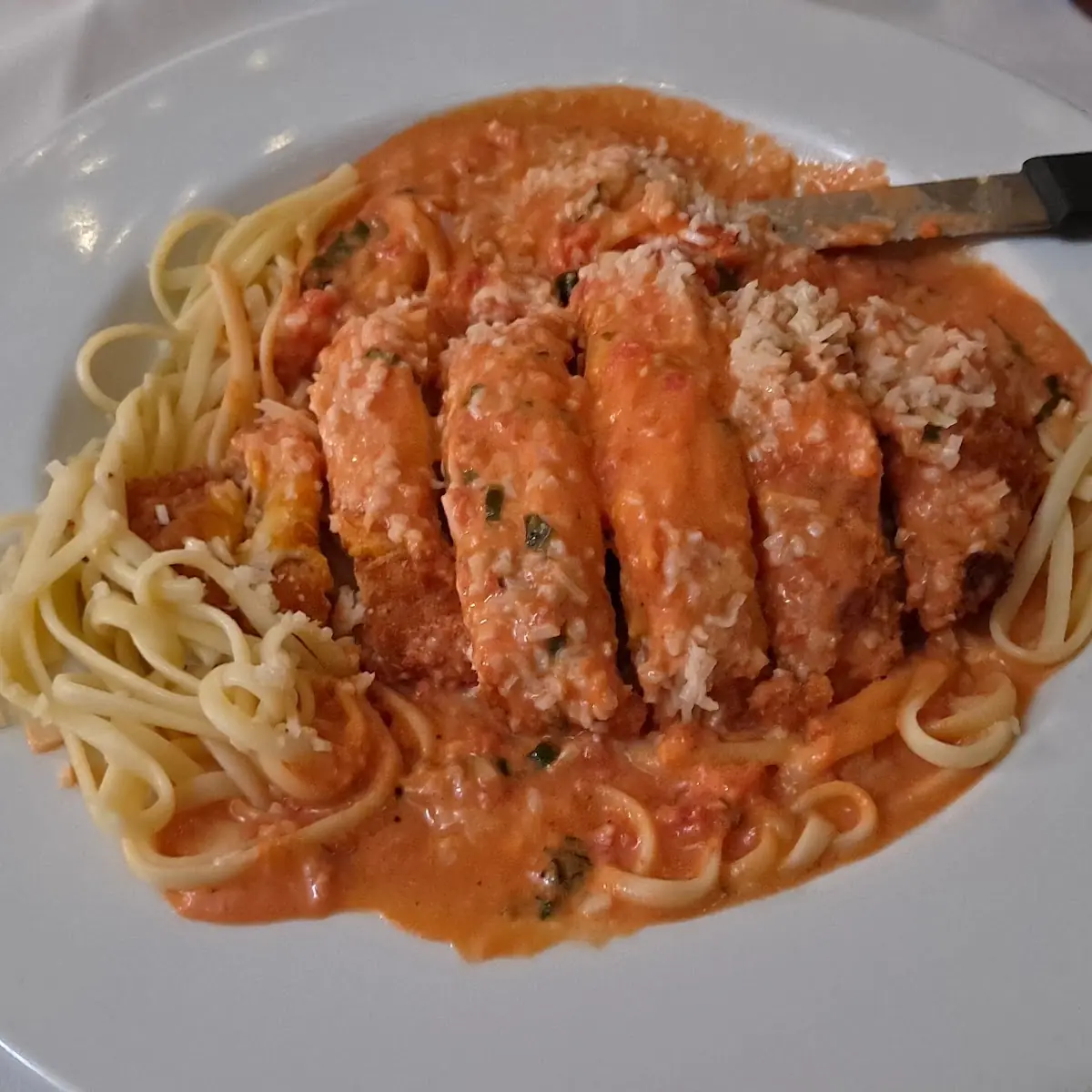Veal Parmigiana over Linguini