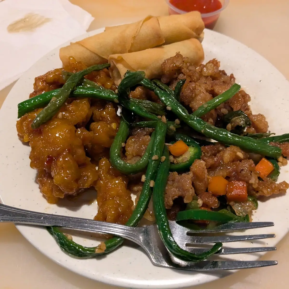General TSO's Chicken Black Pepper Chicken Green Beans and Spring Rolls