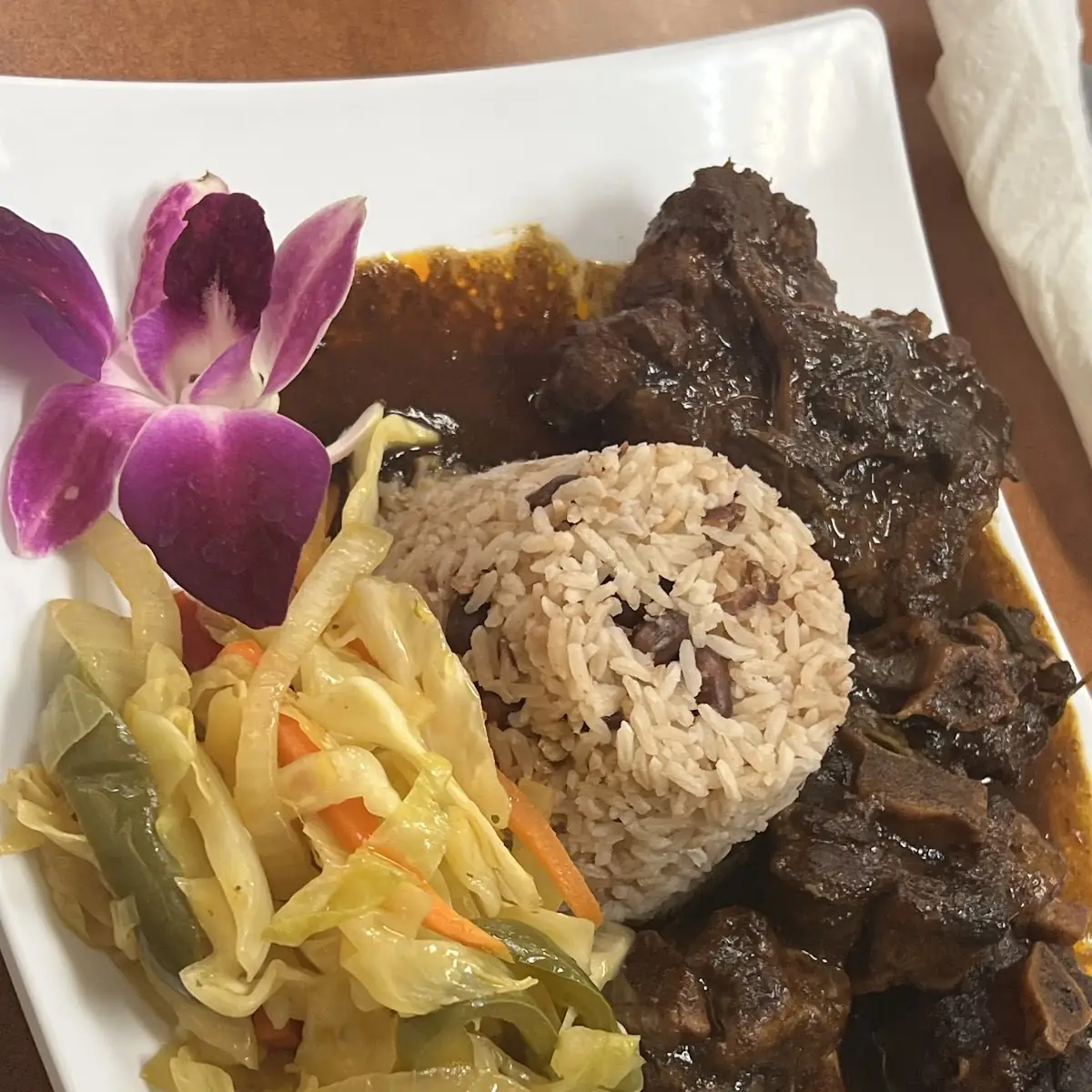 Jamaican Beef Stew with Rice and Cabbage