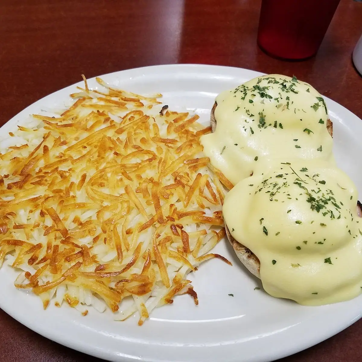 Eggs Benedict and Hash Brown Potatoes