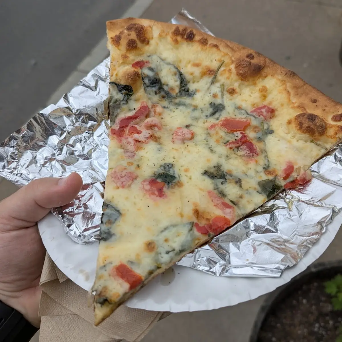 Spinach and Roasted Red Pepper Pizza Slice