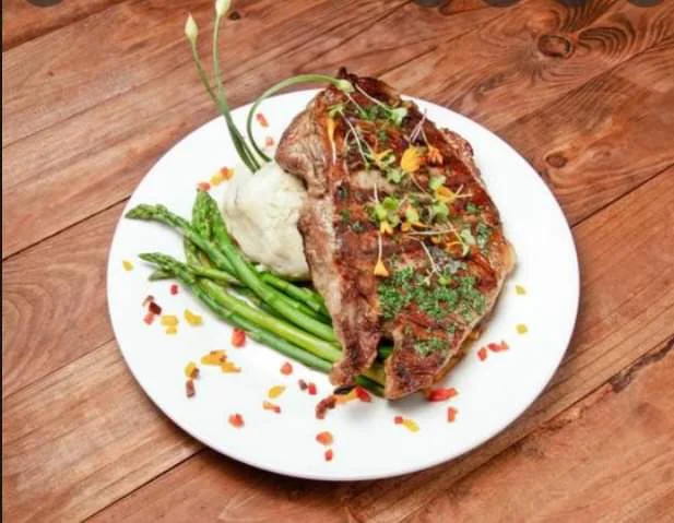Ribeye Steak with Rustic Garlic Mash and Veg