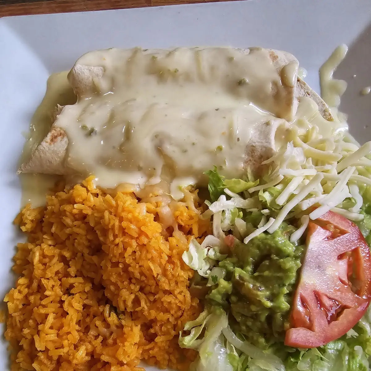 Enchilada 1 Chile Relleno 1 Rice & Beans