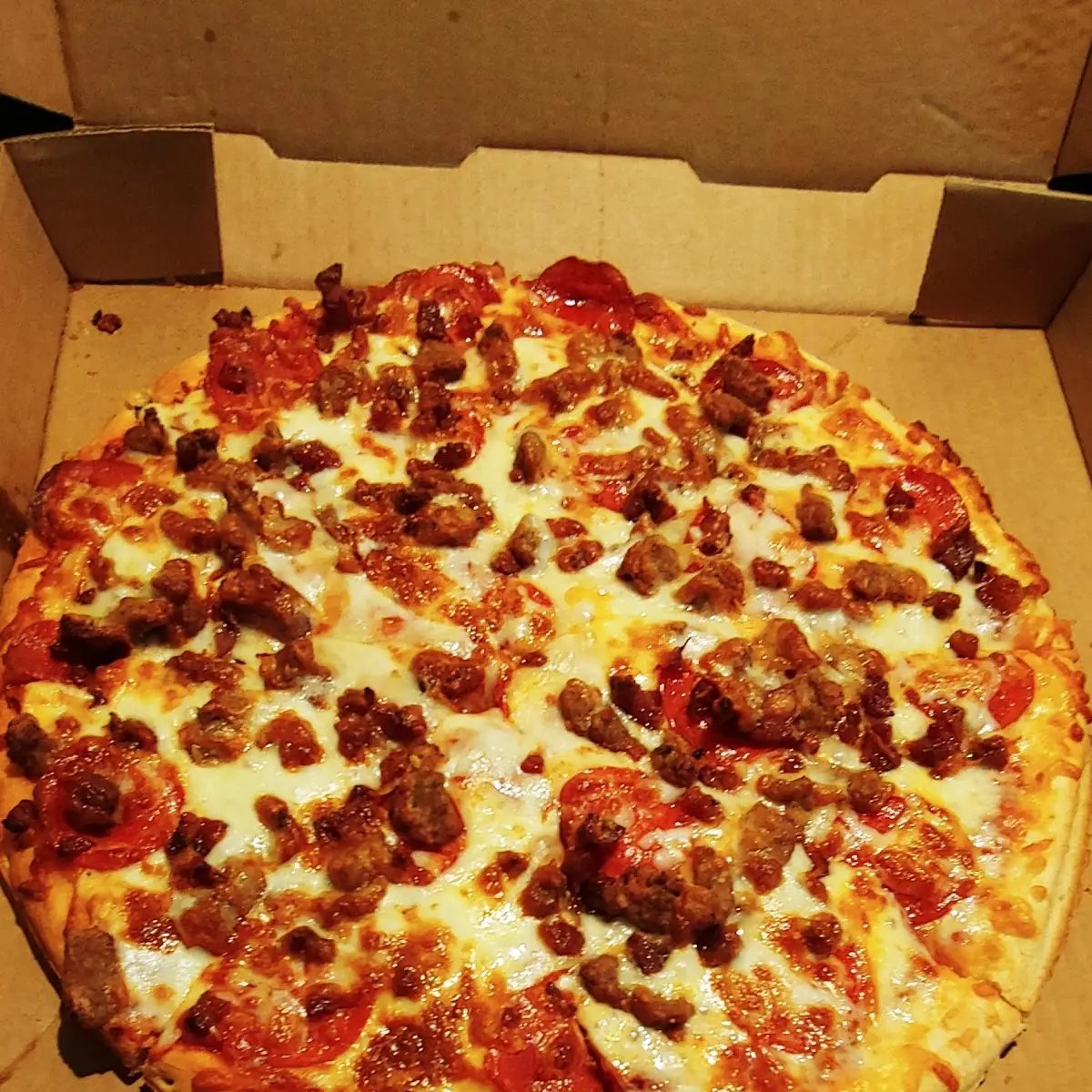 Sausage Bacon and Pepperoni Pizza