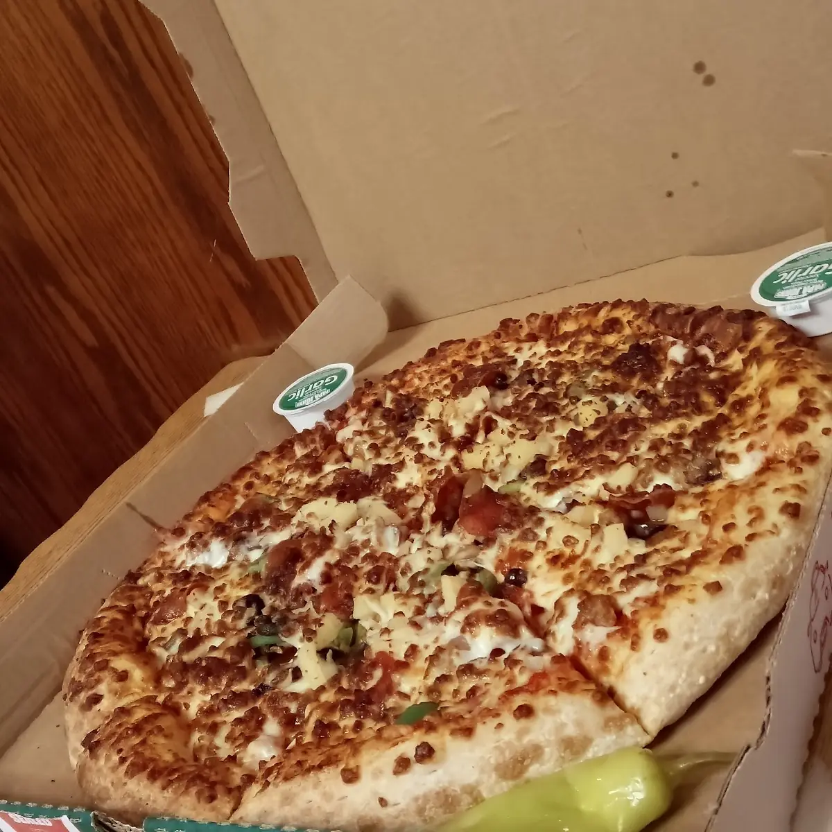 Supreme Pizza with Extra Cheese and Pineapple