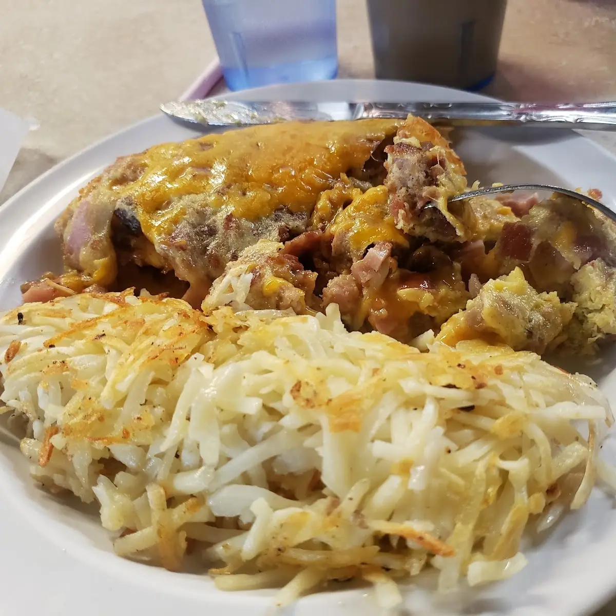 Meat Lovers Omelet with Hash Browns