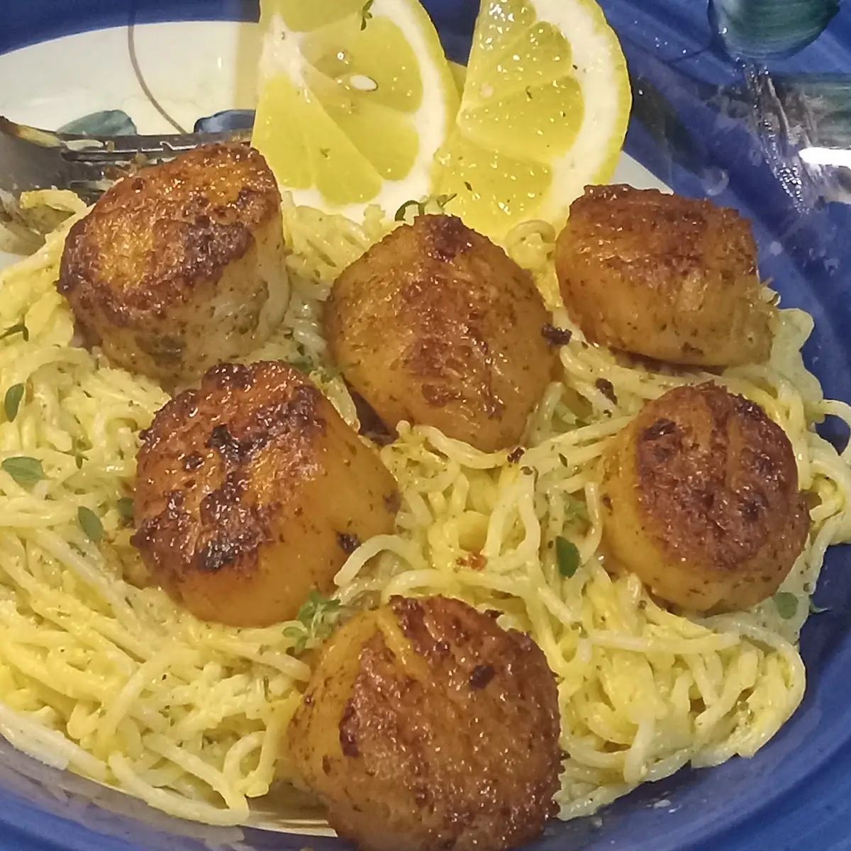 Pan-Seared Scallops with a Lemon Garlic and Herb Light Cream Sauce