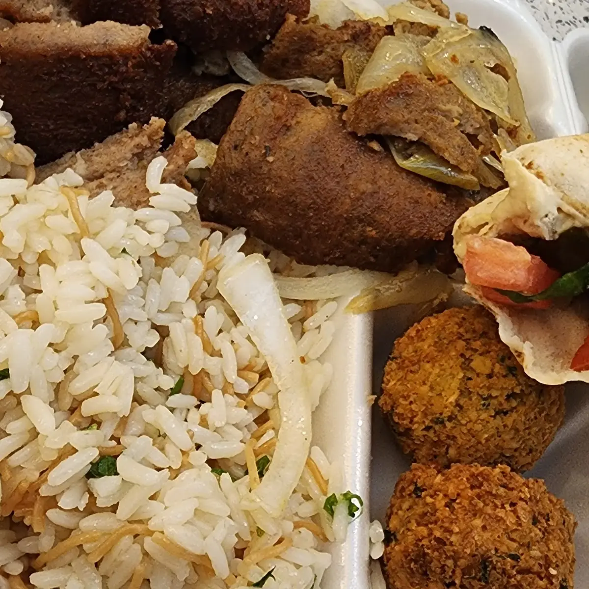 Lamb Chops Rice Pilaf Falafel and Hummus Wrap