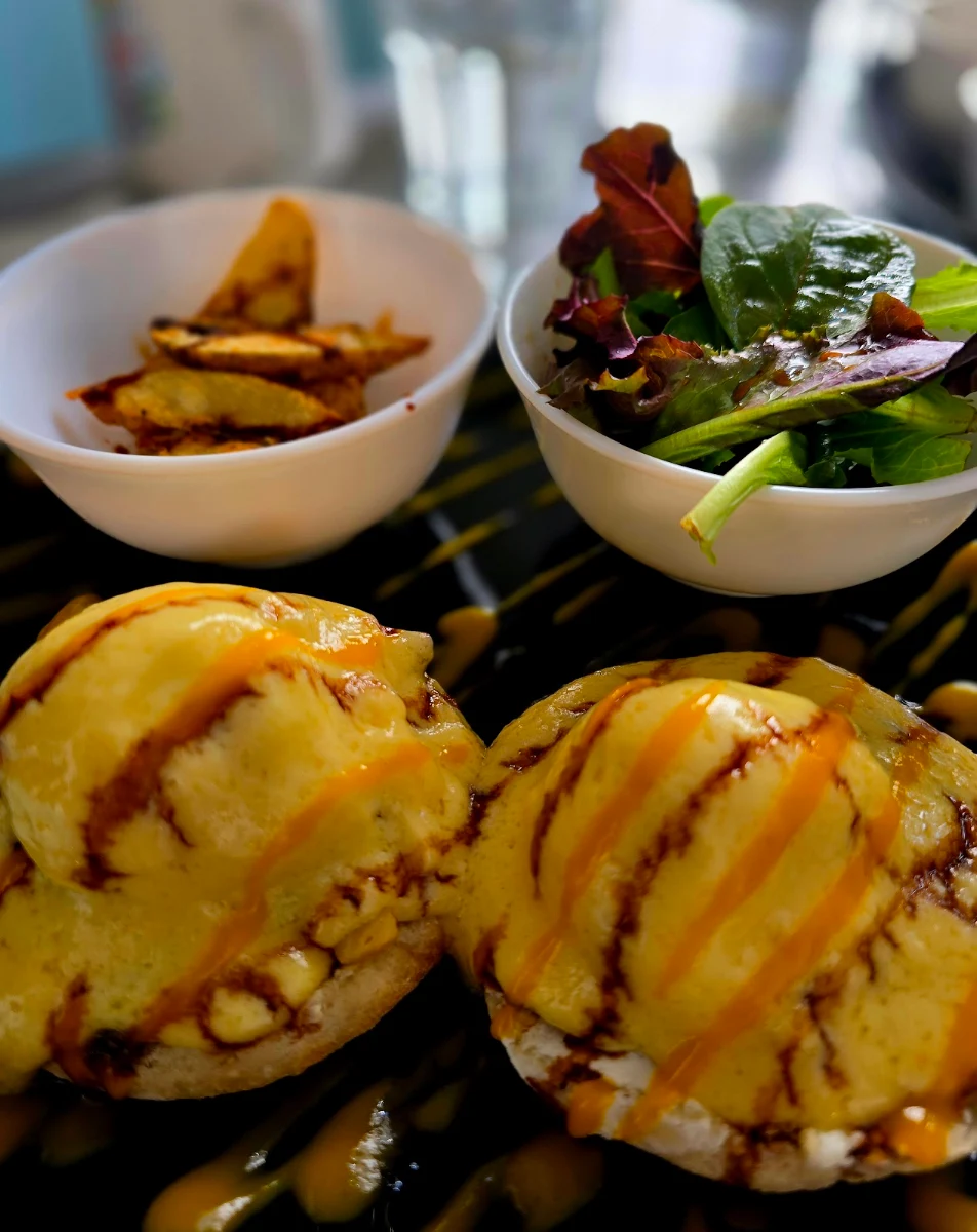 Eggs Benedict with Jerk Chicken