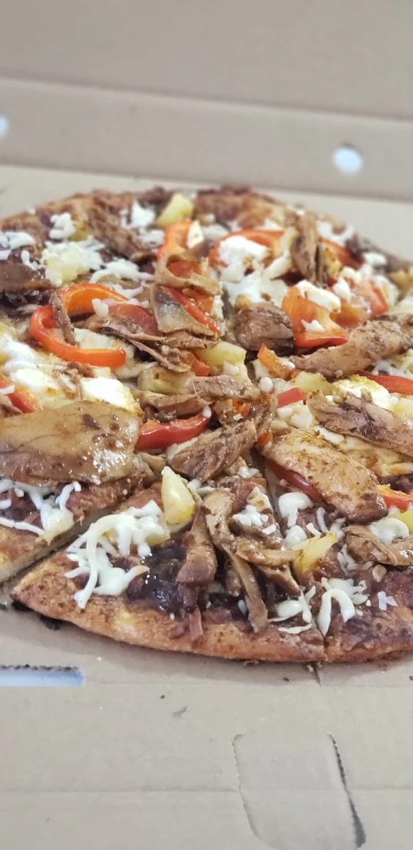 Jerk Chicken Pizza Jerk Sauce Mozzarella Cheese Pepper Goat Cheese Pineapples