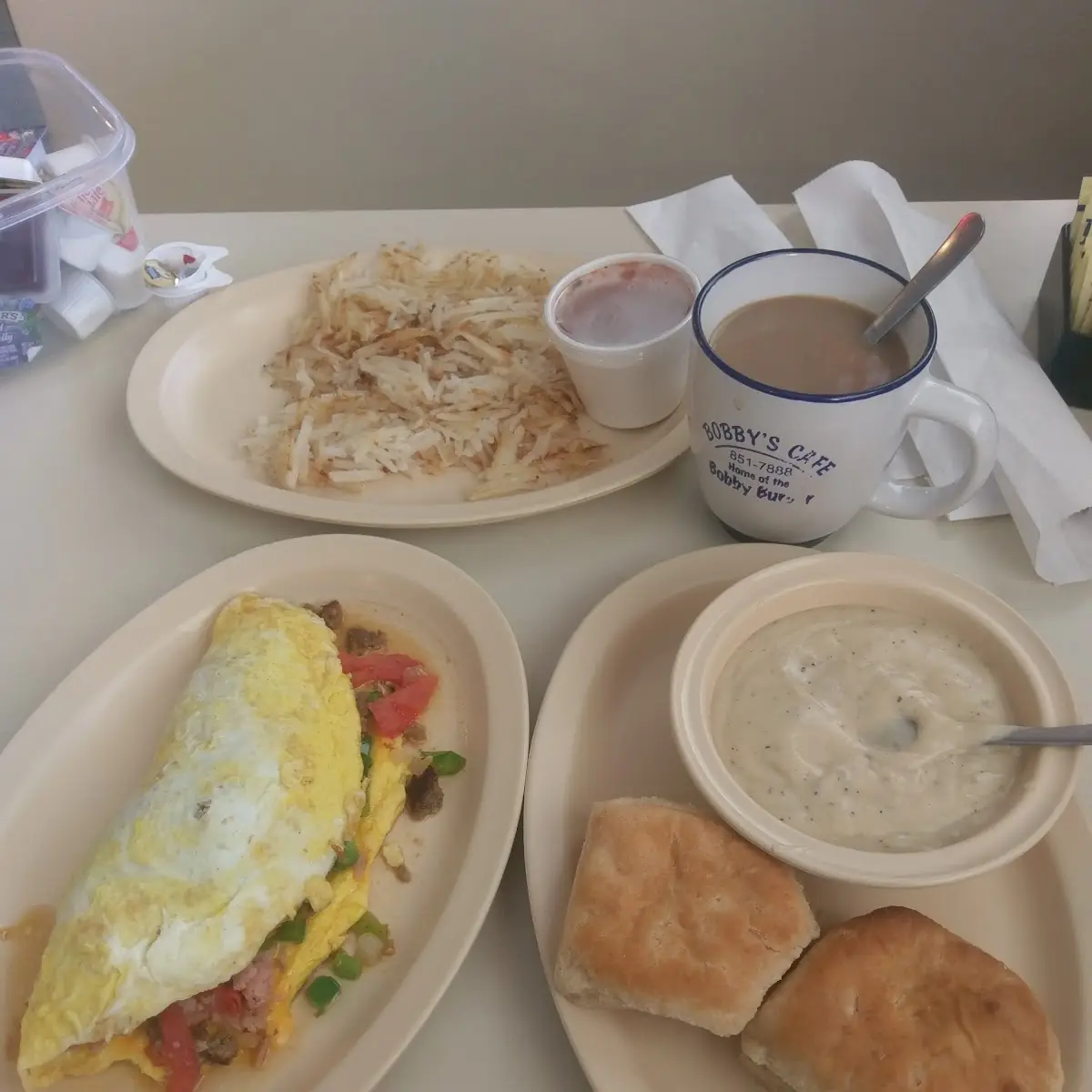 Western Omelette Biscuits and Gravy Hash Browns and Coffee