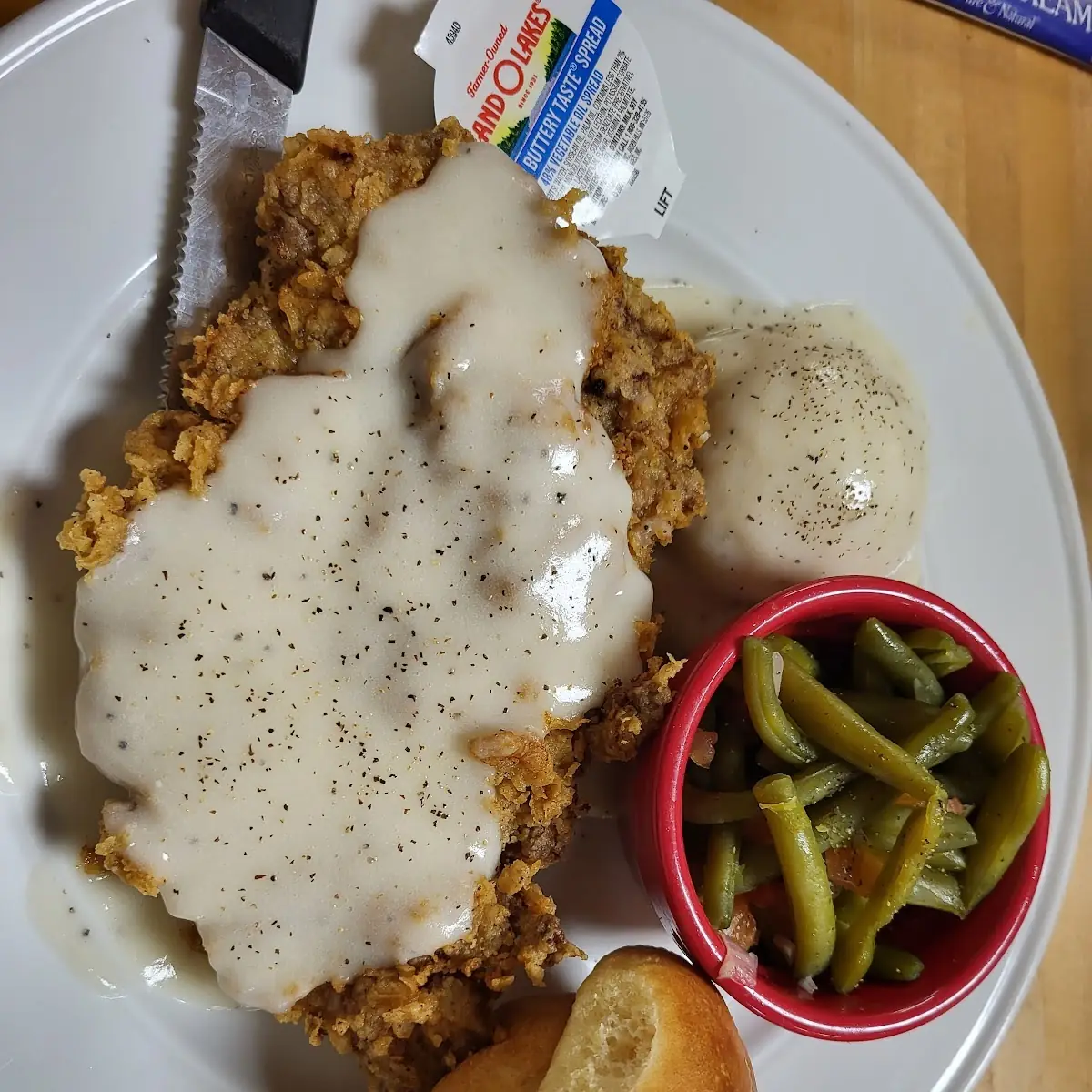 Chicken Fried Steak Mashed Potatoes Green Beans and a Dinner Roll