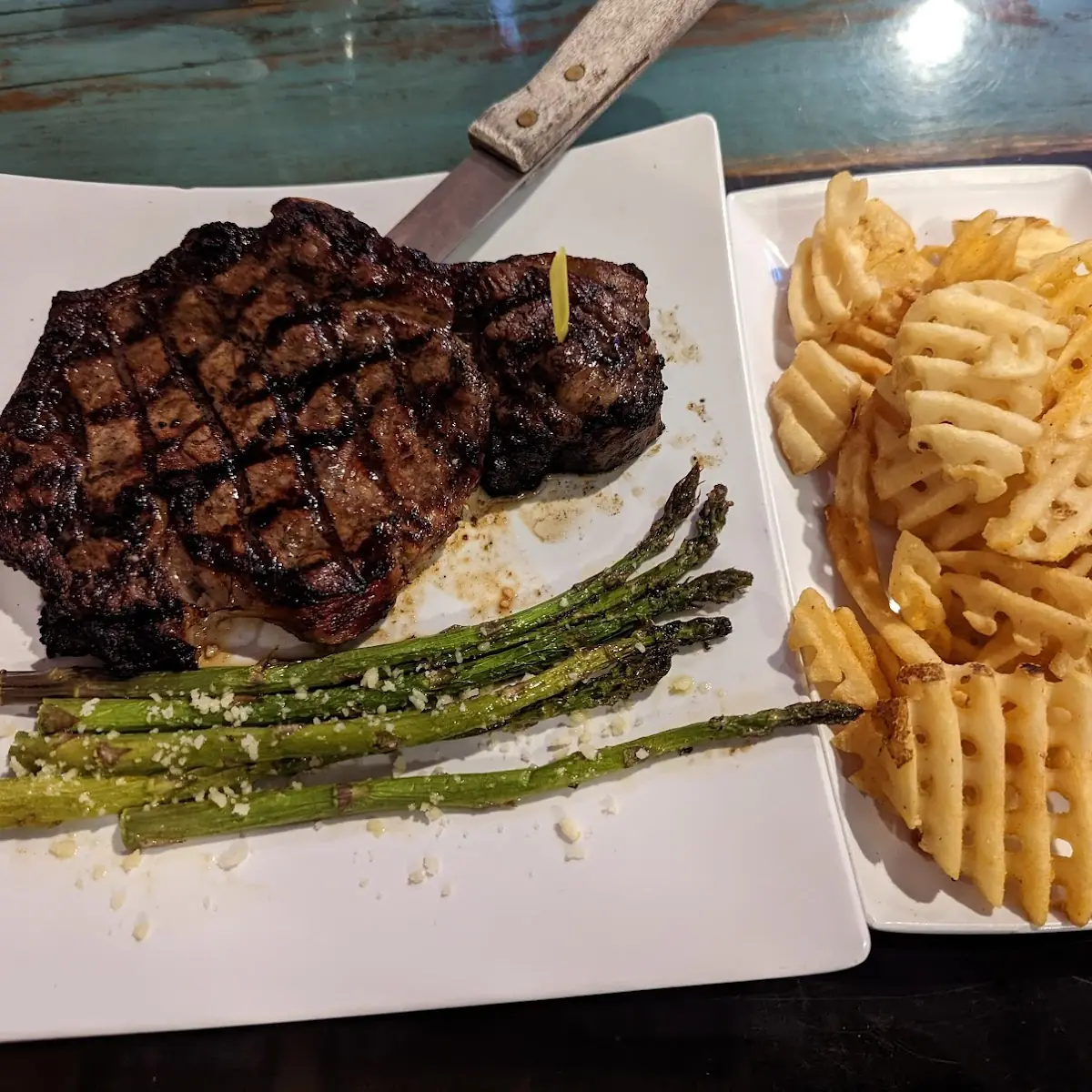 Ribeye Steak and Waffle Fries