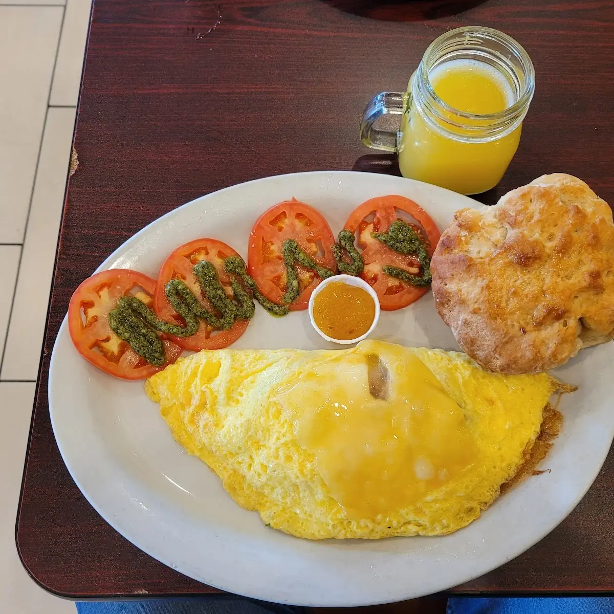 Clint Omelet Bicuit and Tomato Basil