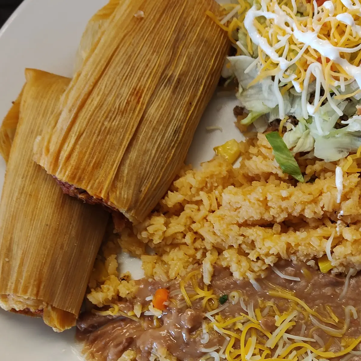 Tamales with Rice and Refried Beans