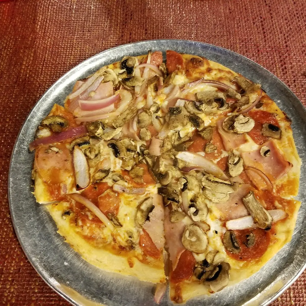 Pepperoni Ham Onion and Mushroom Pizza