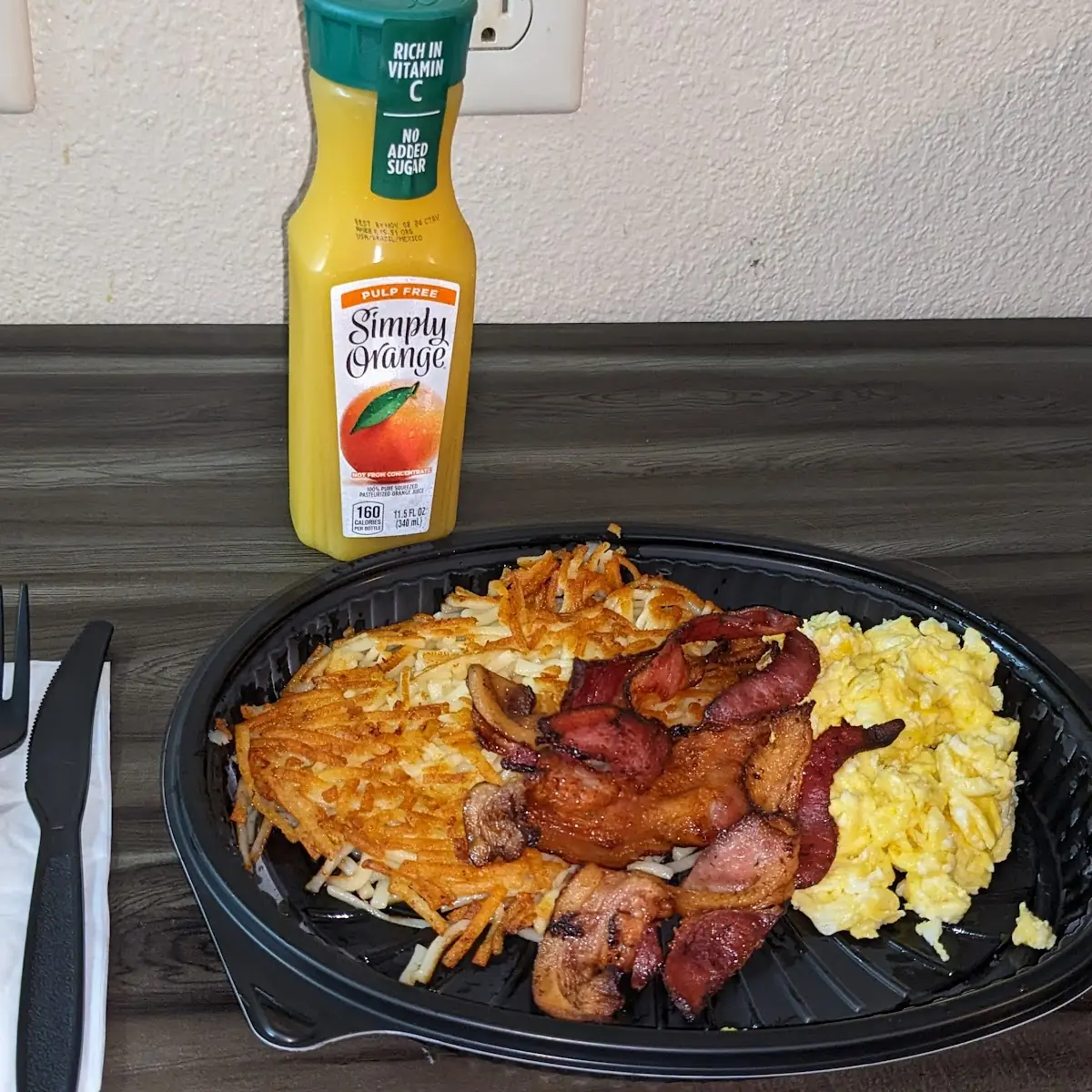 Two Eggs Bacon Hash Browns Simply Orange Juice