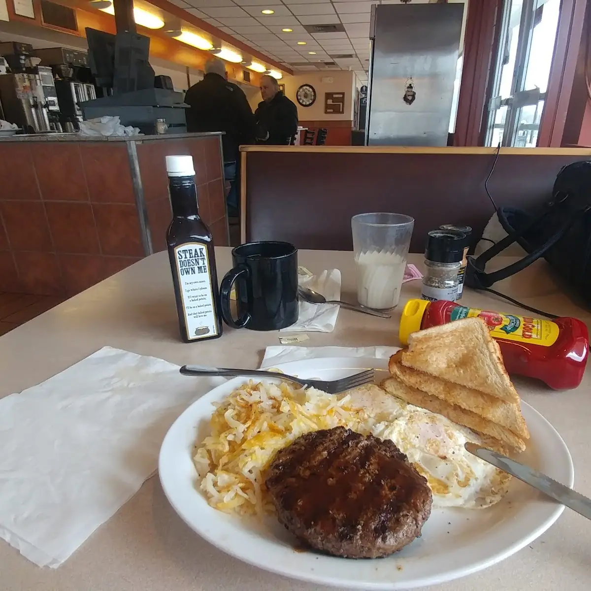 Chop Steak Breakfast Eggs over Medium Hash Browns Toast