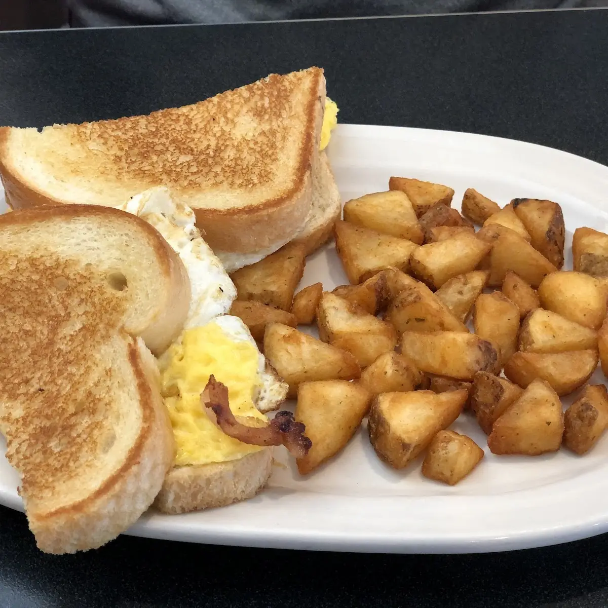 Bacon Egg & Cheese Sandwich with Breakfast Potatoes