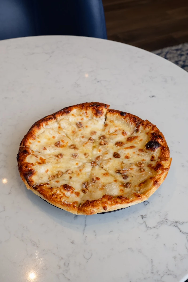 District 48 Butter Chicken Pizza