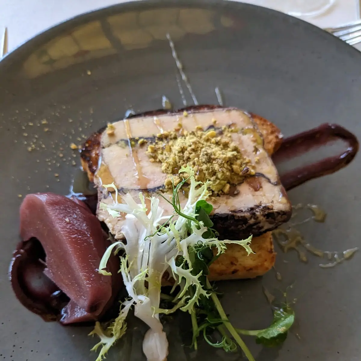 Roasted Pork Shoulder with Caramelized Apples and Truffle Jus