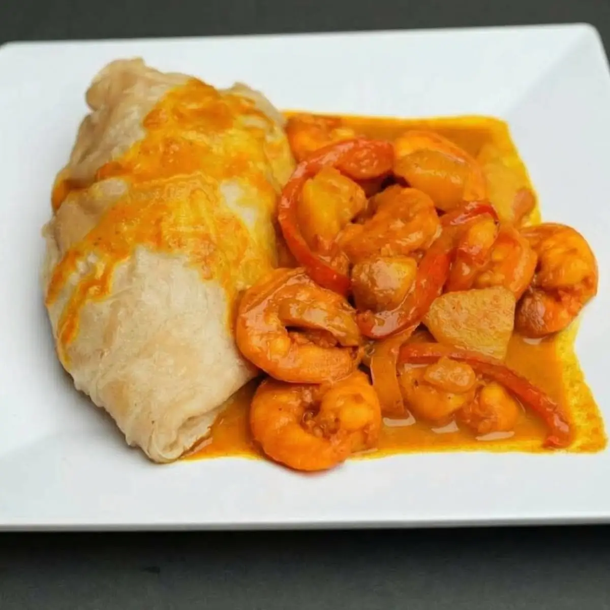 Stew chicken & roti