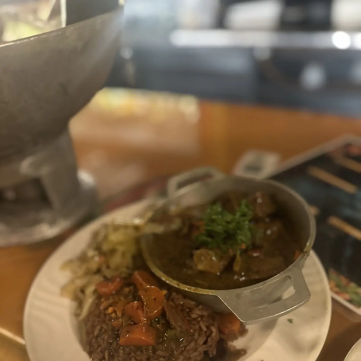 Curry Goat with Cabbage and Rice