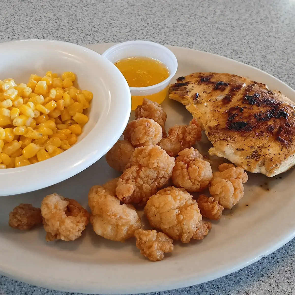 Lemon Pepper Grilled Chicken with Breaded Shrimp and Corn