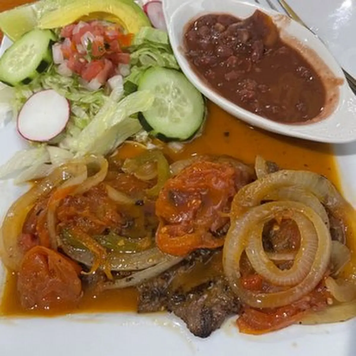 Bistec Encebollado