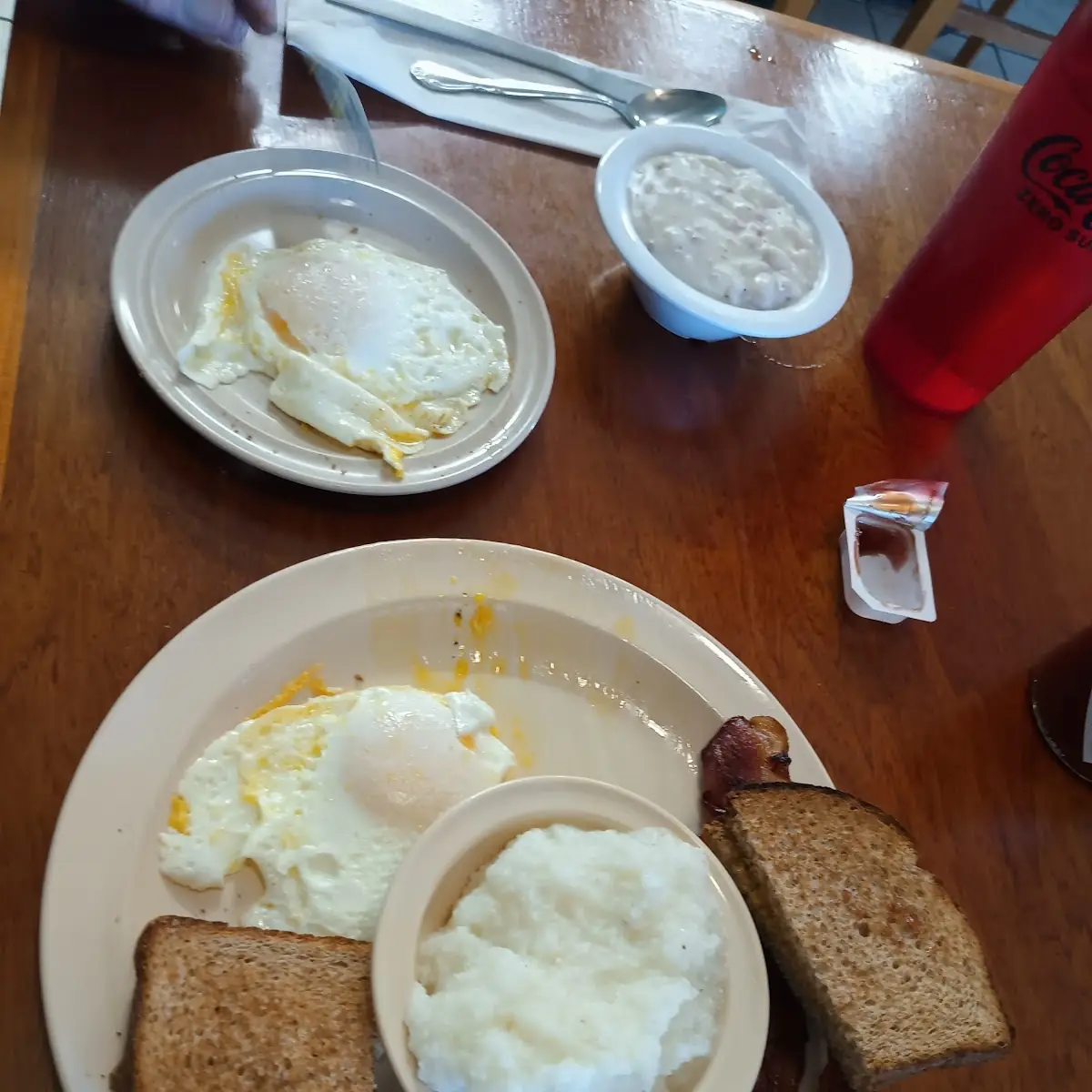 Two Eggs with Bacon and Grits