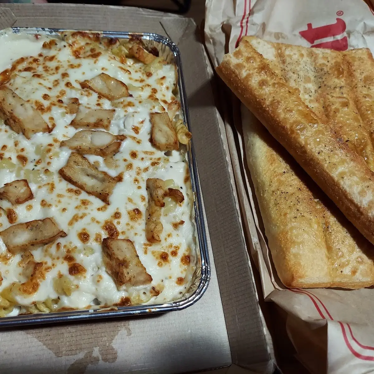 Chicken Alfredo and Bread Sticks