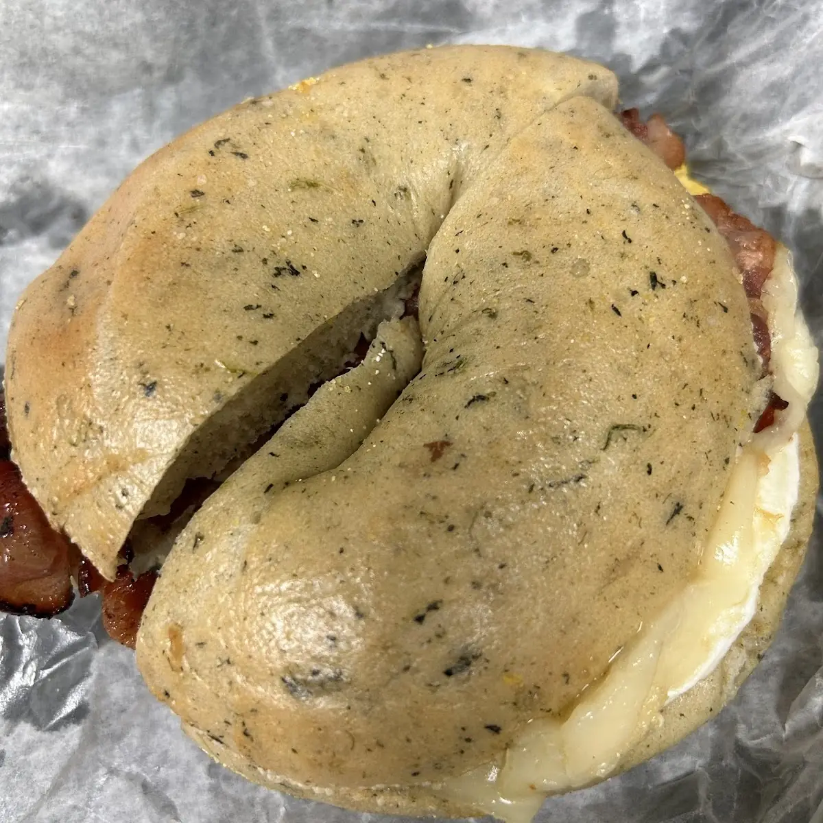 Bacon Egg and Cheese on Spinach Bagel