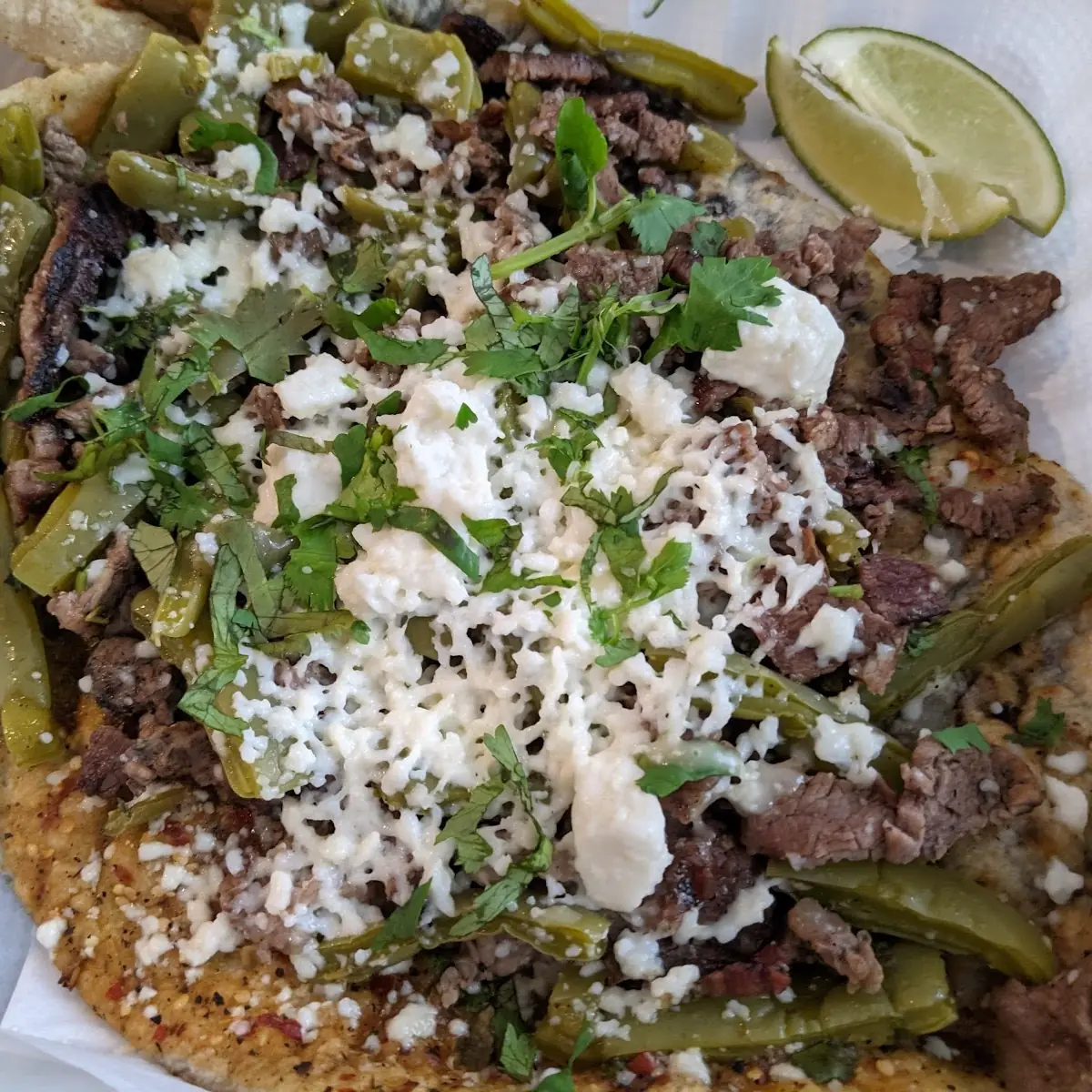 Huaraches with Carne Asada and Nopales
