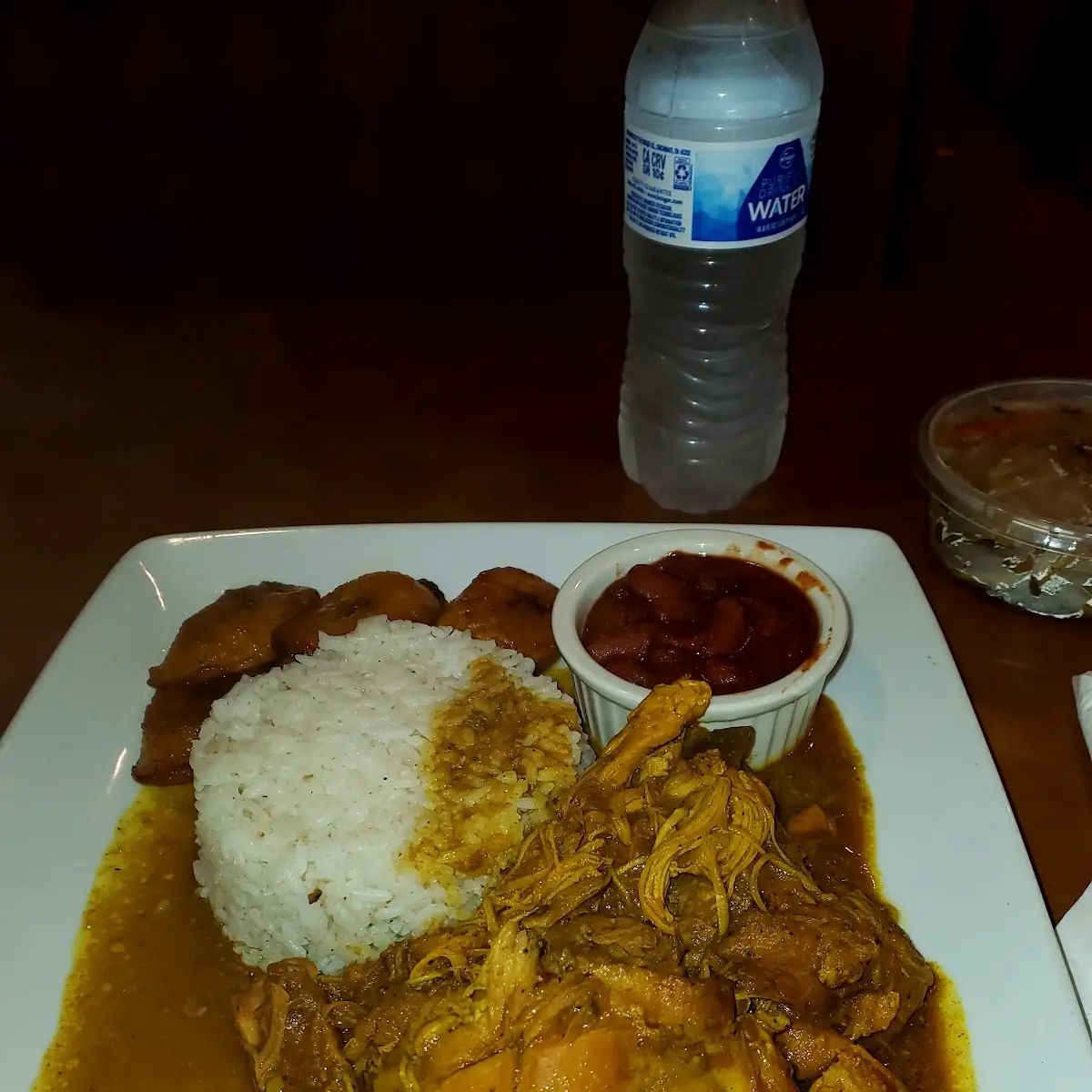 Curry Chicken Rice Red Beans Plantains Cabbage and Cornbread