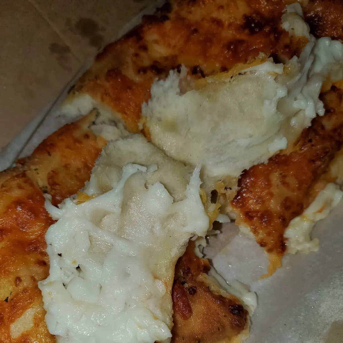 Raw Cheese Bread Entire Bottom of Dish