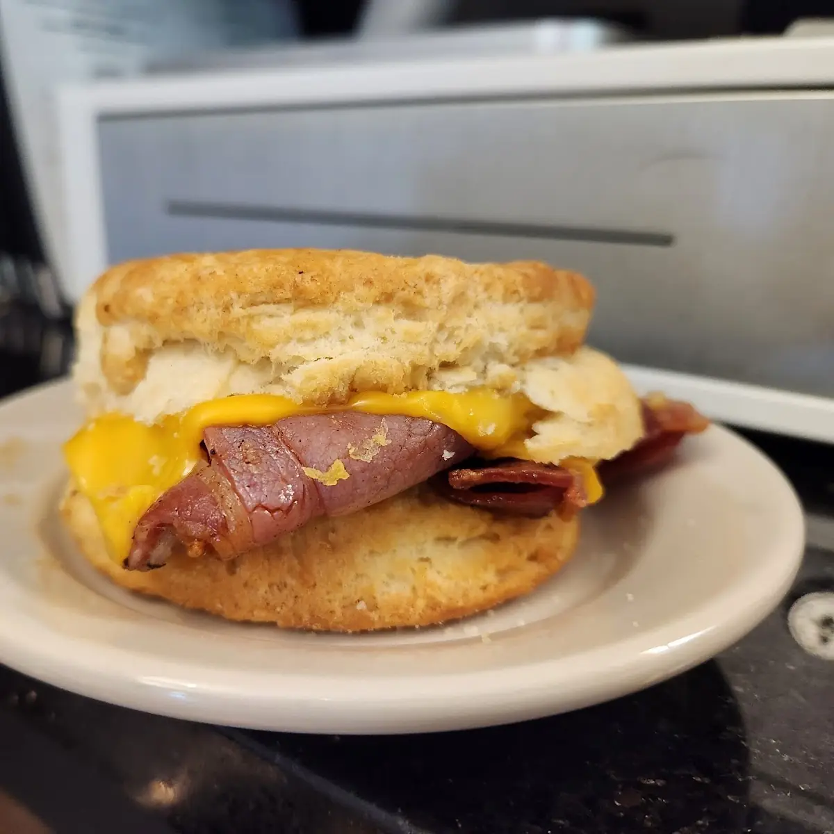 Country Ham Egg and Cheese Biscuit Sandwich