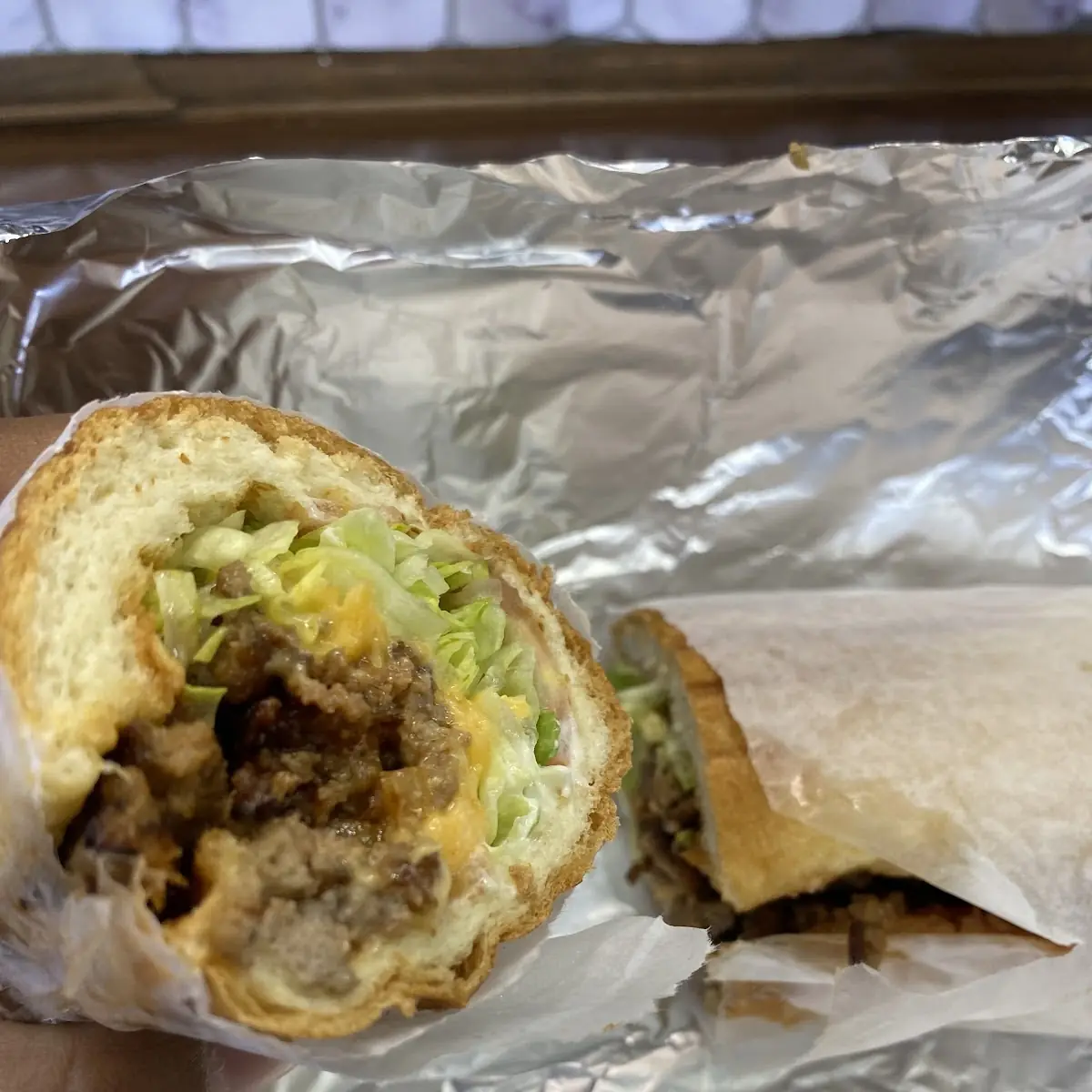 Chopped Cheese Burger with Onions Lettuce Tomato Ketchup and Mayo