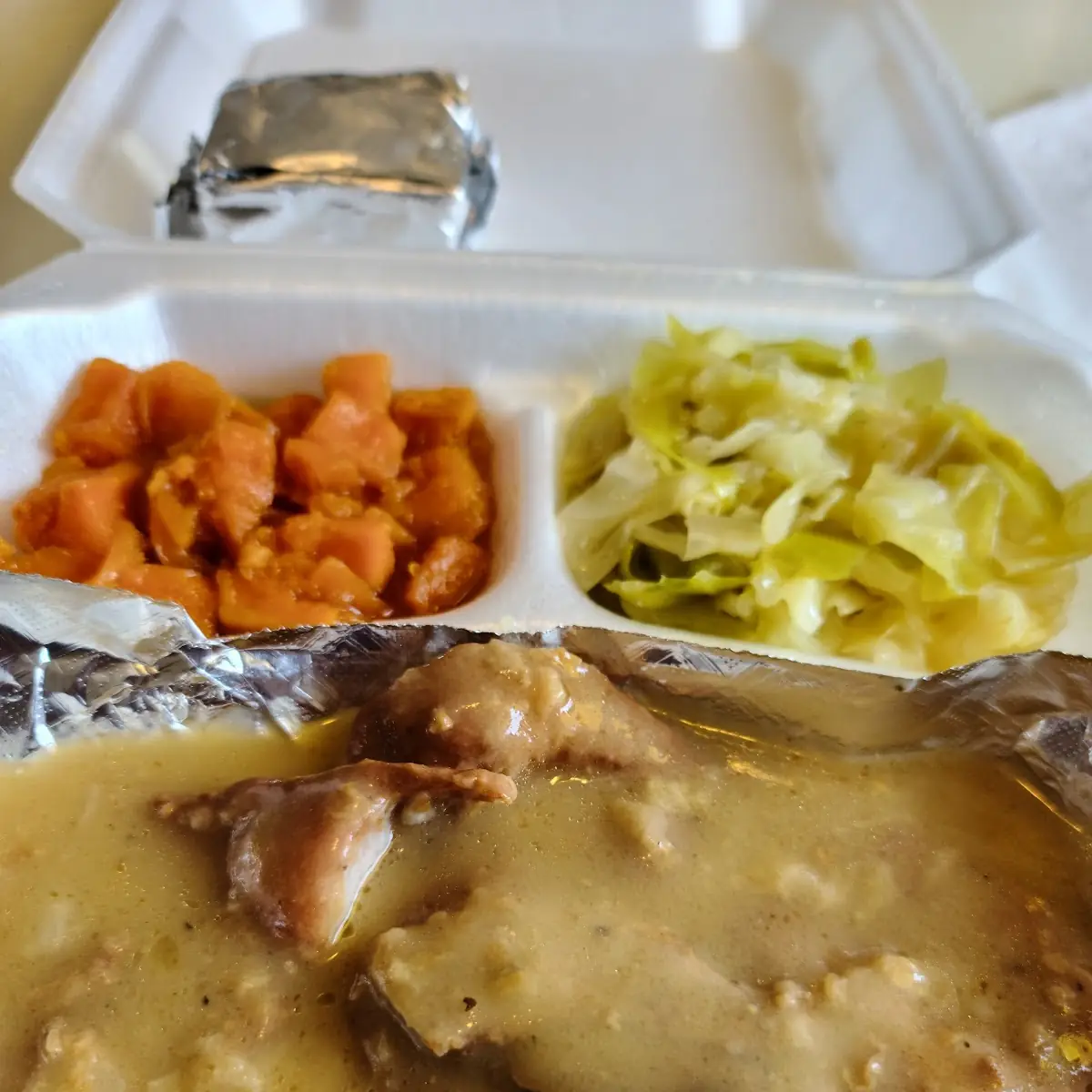 Friday Special Smothered Pork Chop Lunch