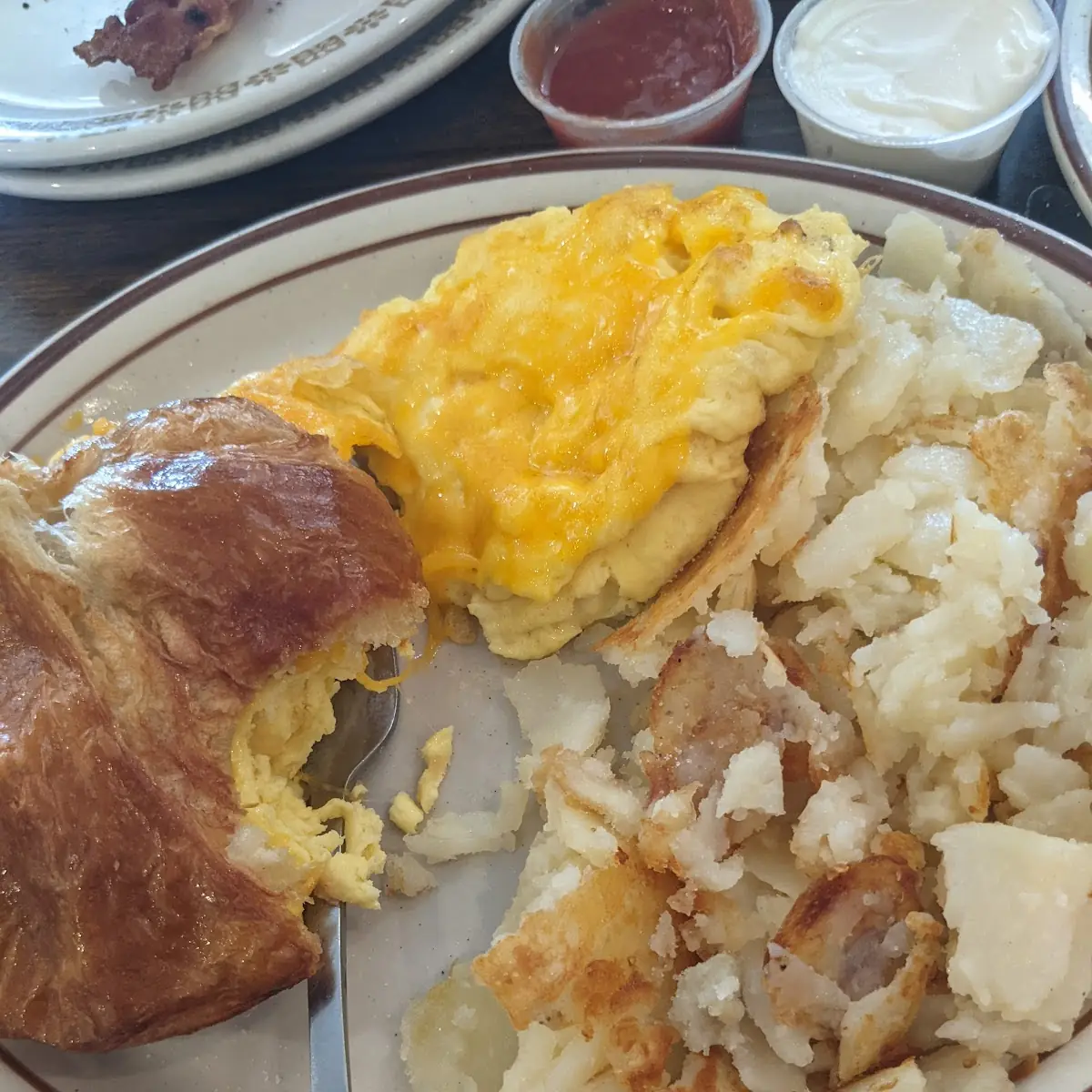 Egg & Cheese Croissant with Potatoes and Scrambled Eggs w Cheese
