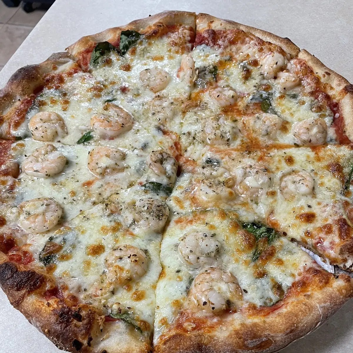 Red Shrimp and Fresh Spinach Pizza with Mozzarella