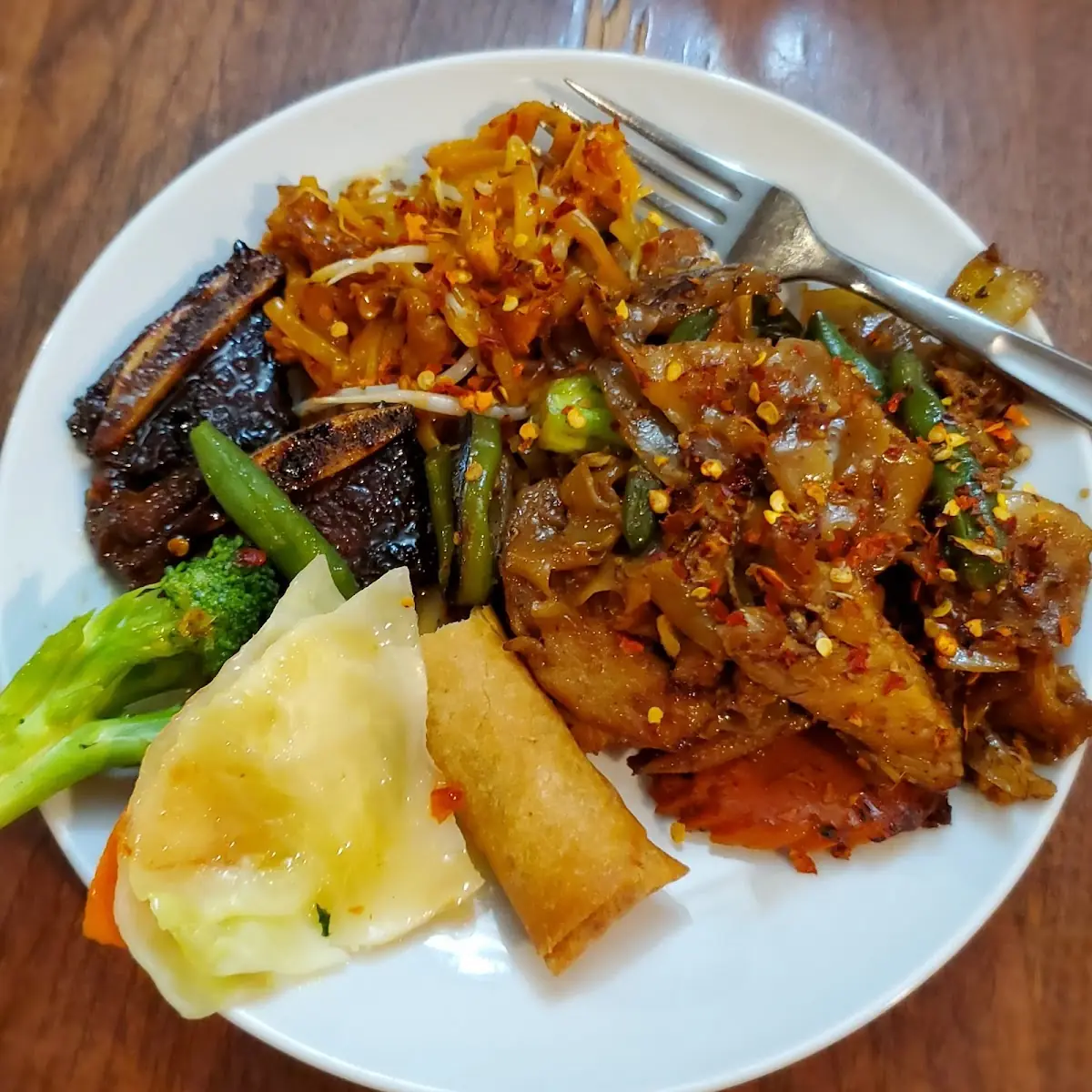 Chicken Pad See Eew Beef Pad Thai Beef Short Ribs with Steamed Veggies & an Egg Roll