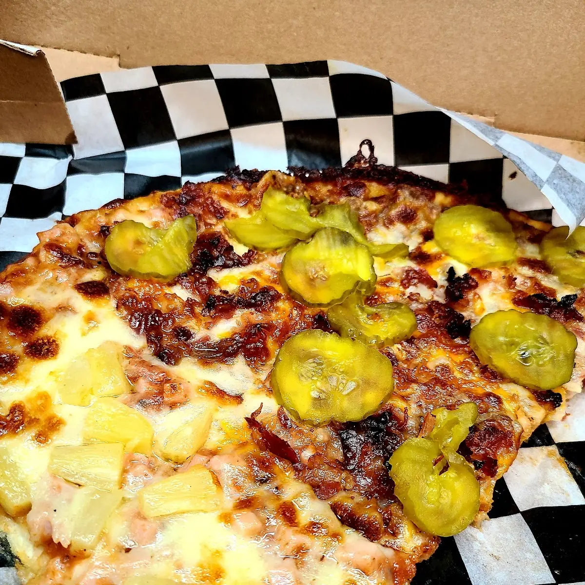 Half Bacon Cheeseburger Pizza Half Hawaiian Pizza