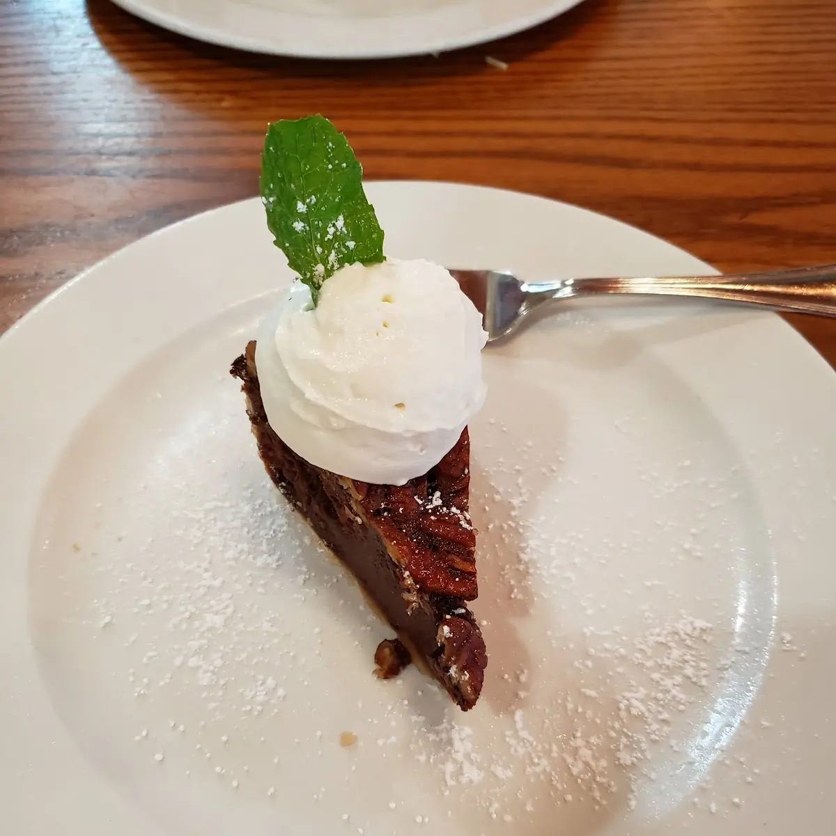 Dark Chocolate Pecan Pie with Whipped Cream