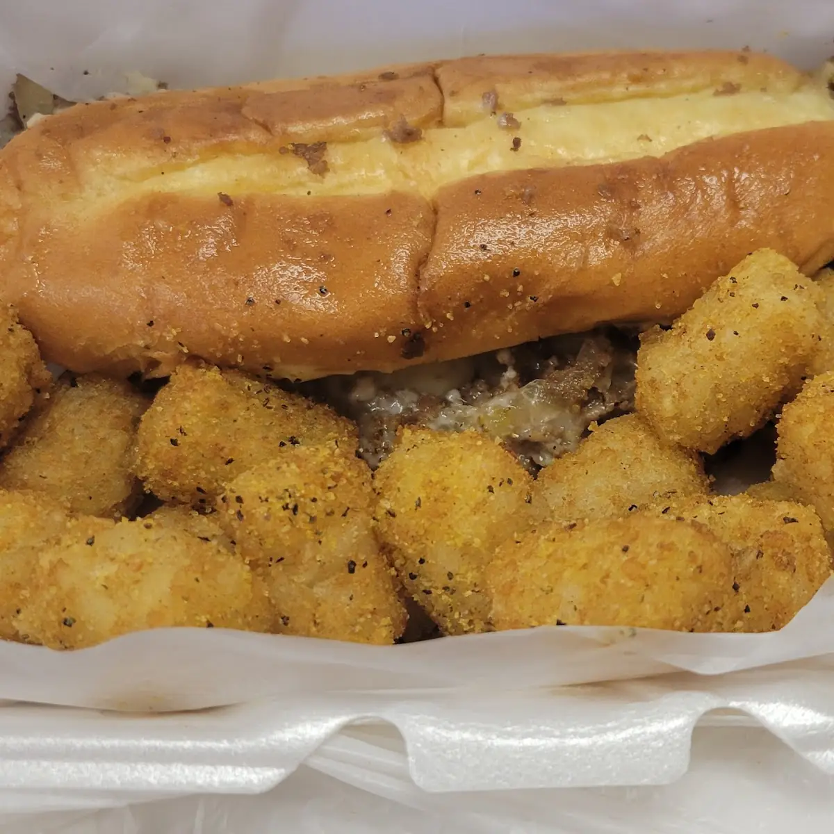 Philly Cheese Steak Sandwich with Lemon Pepper Tots