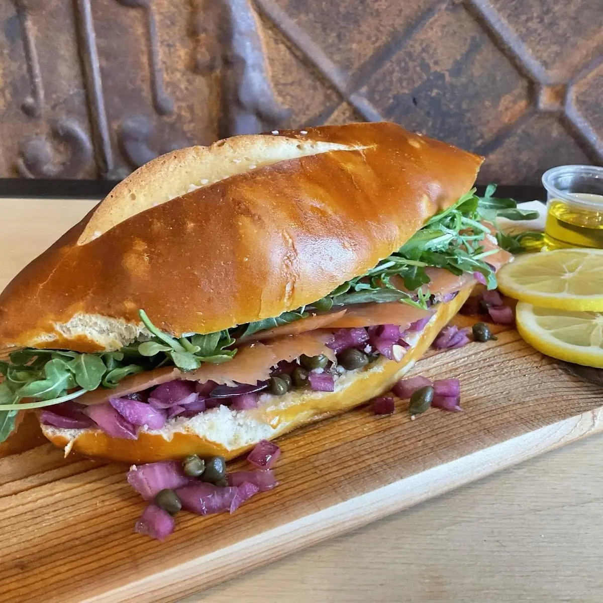 Stockholm Salmon Sandwich on Pretzel Bun