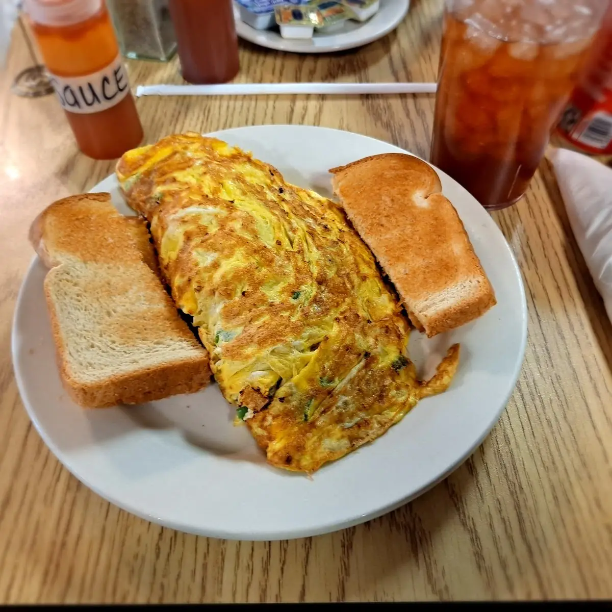 Steak Omlet with White Toast and Ice Tea