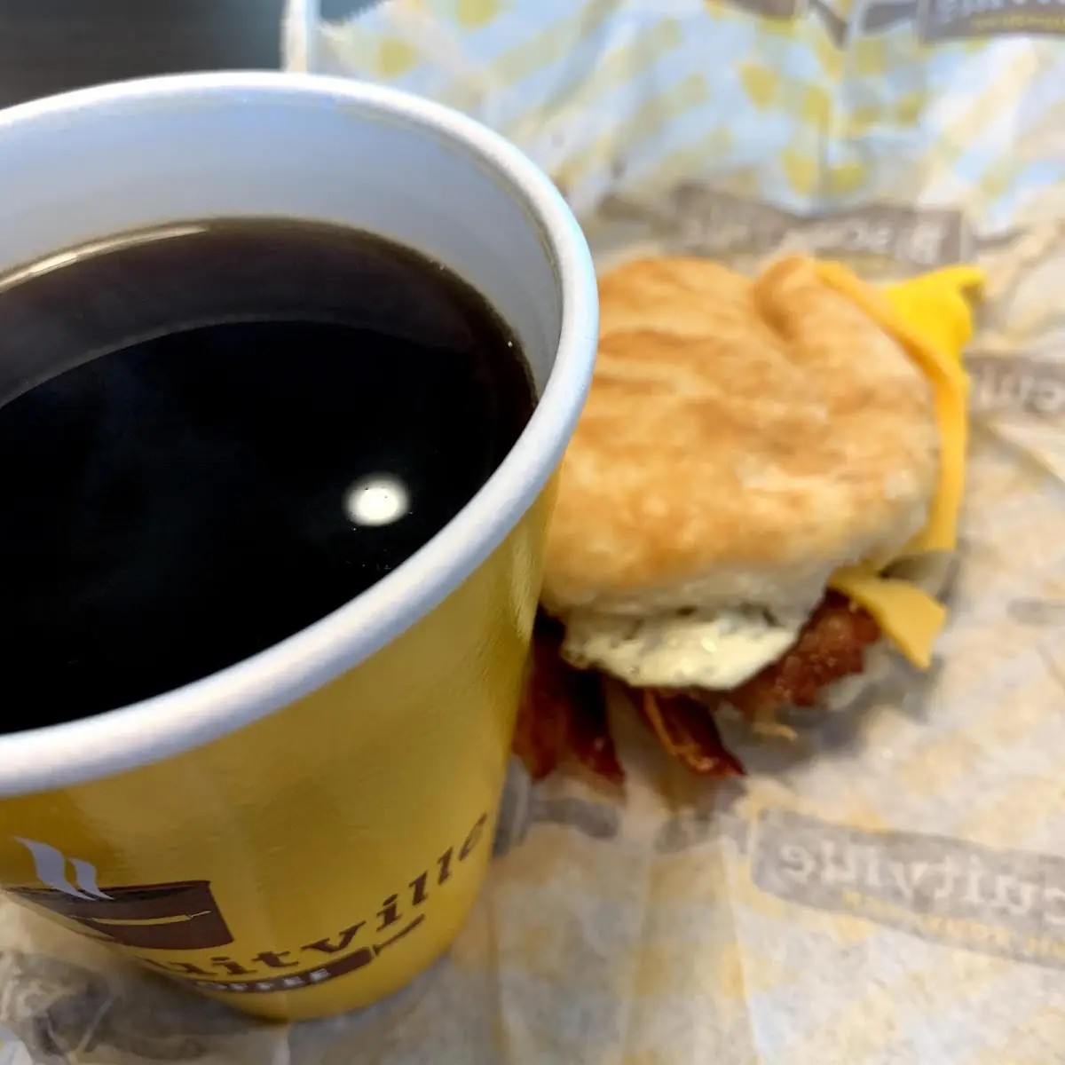 Bacon Egg and Cheese Biscuit with Coffee
