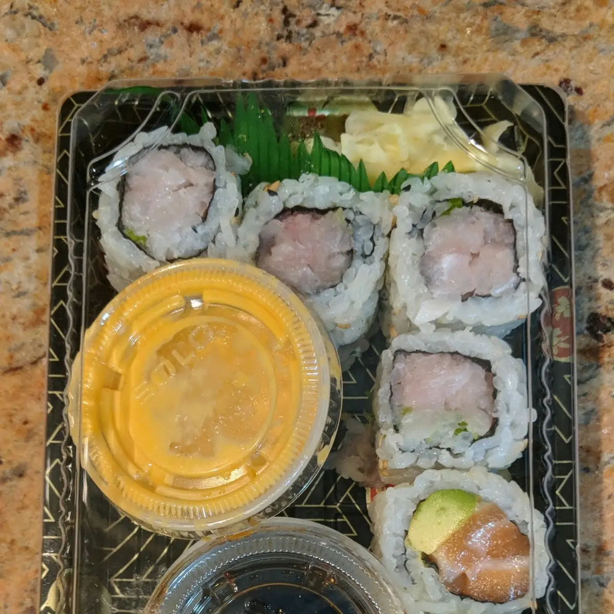 Salmon Avocado and Yellow Tail Scallion Sushi Roll