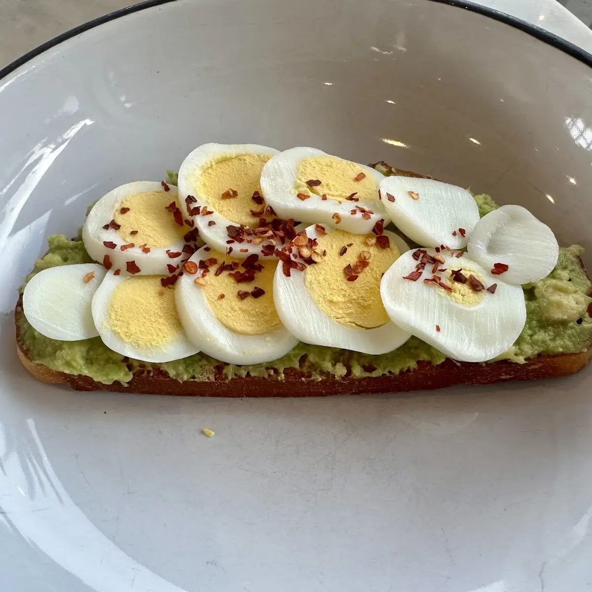 Avocado Toast Served with a Boiled Egg