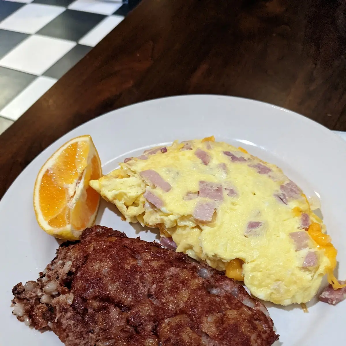 Ham and Cheese Omelette with a Side of Corned Beef Hash